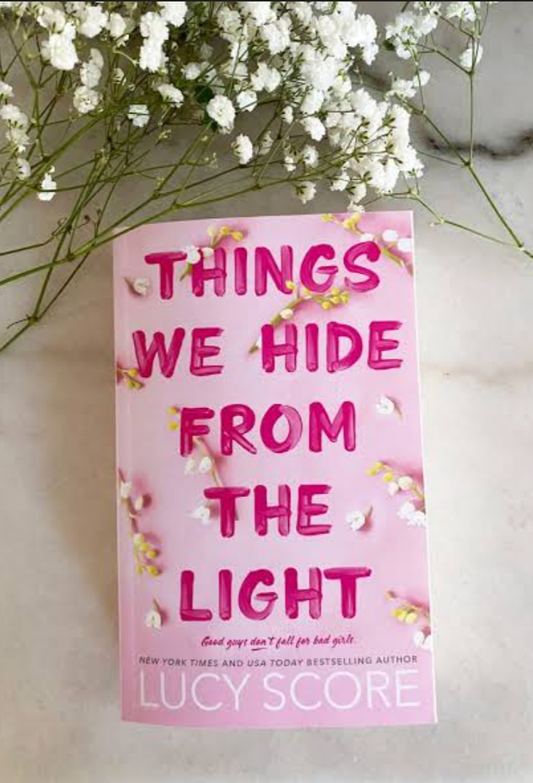 Things We Hide From The Light Novel By Lucy Score Best Selling Ks (book)