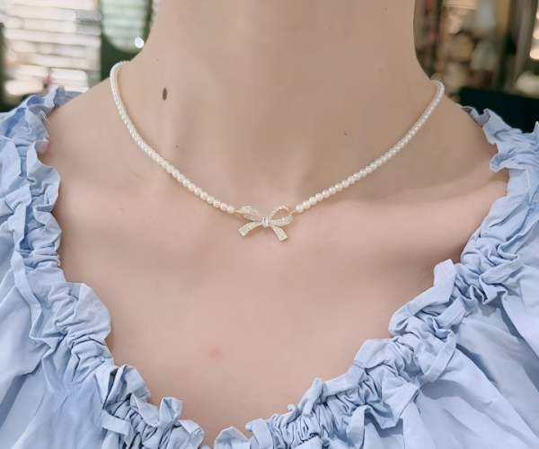Pqt-992 – Bow Shape Pearl Pendant Necklace For Women – Dainty Jewelry With Sparkling Bow Design | Available In Silver & Golden Finish | Perfect Gift For Weddings, Parties & Everyday Glamour